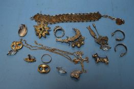 A BAG OF WHITE METAL JEWELLERY