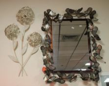 A MODERN MIRROR DECORATED WITH BUTTERFLIES TOGETHER WITH A WALL ART FLOWER