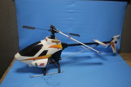A VINTAGE VENTURE CP REMOTE CONTROL HELICOPTER WITH INSTRUCTIONS, SIX CHANNEL RADIO, FUEL AND