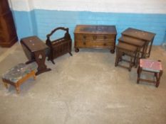 SIX ITEMS - AN OAK TWIST TOP DROP LEAF TABLE, AN OAK NEST OF THREE TABLES, TWO VINTAGE STOOLS, AN