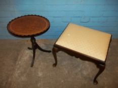 A QUEEN ANNE LEGGED DRESSING STOOL AND AN OVAL LEATHER INLAID PEDESTAL WINE TABLE