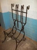 A FIRESIDE STEEL LOG AND COMPANION SET HOLDER