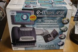 A BOXED AMSTRAD EMAILER PERSONAL COMMUNICATION CENTRE