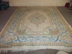 AN ORIENTAL CHINESE RUG, W 270 CM X L 370 CM
