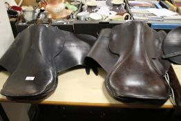 TWO VINTAGE ENGLISH LEATHER SADDLES, ONE A/F