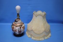 AN ORIENTAL STYLE TABLE LAMP
