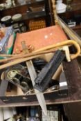 A BOX OF COLLECTABLES TO INCLUDE WALKING STICKS, MODEL LOCOMOTIVES, A WEDDING ALBUM ETC.