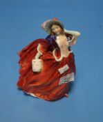 A ROYAL DOULTON FIGURINE 