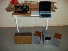 A VINTAGE JONES HAND SEWING MACHINE, A KNITTING MACHINE, A BROTHER PORTABLE TYPEWRITER AND A SONY