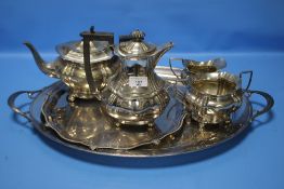 A FOUR PIECE SILVER PLATED TEASET WITH TWO TRAYS
