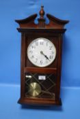 A REPRODUCTION WESTMINSTER CHIME WALLCLOCK