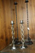 TWO PAIRS OF METAL CANDLESTICKS