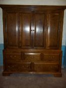 A BESPOKE SOLID OAK LARGE TV MEDIA UNIT, 149 CM WIDE