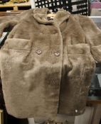 AN ASTRAKA OF LONDON FULL LENGTH COAT SIZE 14 WITH ORIGINAL TAG LABEL