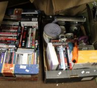 TWO BOXES OF DVDS, CDS, ORNAMENTS AND SELFIE STICK