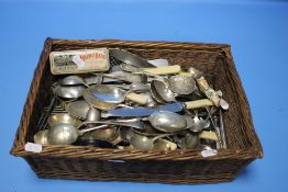 A BASKET OF ASSORTED CUTLERY