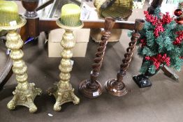 TWO PAIRS OF CANDLESTICKS, ONE TALL WOODEN BARLEY TWIST 48 CM HIGH AND OTHER TALL GILT 46 CM AND A