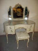 A LOUIS STYLE TRIPLE MIRROR DRESSING TABLE AND STOOL