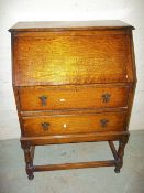 AN OAK BUREAU WRITING DESK
