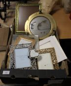 A BOX OF PICTURE FRAMES WITH A BRASS PORTHOLE MIRROR