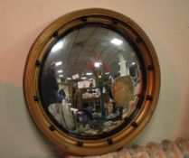 A CIRCULAR FRAMED MIRROR DIAMETER 51 CM