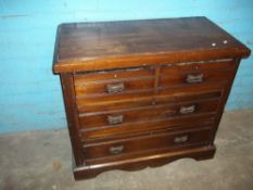 AN ANTIQUE FOUR DRAWER CHEST, TWO OVER TWO