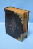 A LEATHER BOUND FAMILY BIBLE, JOHN EADIE, WITH GILT METAL CLASPS