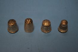 FIVE HALLMARKED SILVER THIMBLES