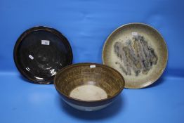 A STUDIO POTTERY BOWL AND TWO PLATES
