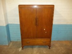 AN OAK VINTAGE TALL BOY