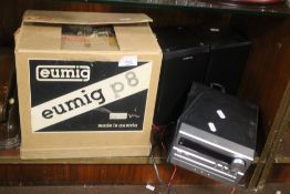 A EUMIG P8 FILM PROJECTOR IN BOX TOGETHER WITH A PANASONIC CD PLAYER, WITH SPEAKERS