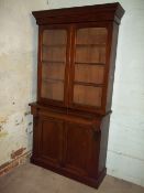 A VICTORIAN MAHOGANY GLAZED BOOKCASE WITH CONCEALED DRAWER, 104 CM WIDE