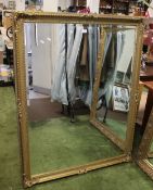 A LARGE REPRODUCTION GILT FRAMED MIRROR