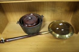 A BRASS JAM PAN, PLANTER AND BED WARMER AND A STEW POT