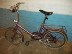 A GIRLS RALEIGH SAFFRON BICYCLE