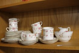 A VICTORIAN ROSE PATTERN TEA SET, SOME PIECES A/F