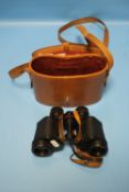 A SET OF BARR AND STROUD CF24 8 X 30 ANTIQUE LEATHER CASED BINOCULARS