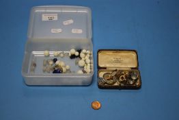 A COLLECTION OF ANTIQUE STUDS AND BEADS