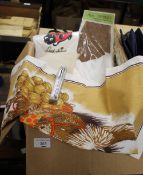A BOX OF LINEN TO INCLUDE WOOLWORTHS LADYBIRD T-SHIRT, ARISTOC STOCKINGS, A RETRO TEATOWEL AND A