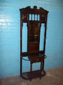 A MAHOGANY EDWARDIAN COAT HALL STAND