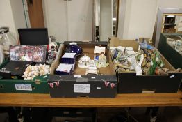 THREE BOXES OF ORNAMENTS TO INCLUDE CHINA, SHELLS, GLASSWARE, GUITAR HEROES CD SET ETC.