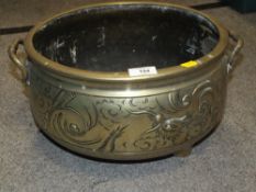 AN LARGE ORIENTAL STYLE BRASS CENSOR, HANDLE TO HANDLE WIDTH 40 CM