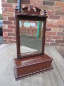 A SMALL EDWARDIAN MIRRORED HANGING SHELF S/D