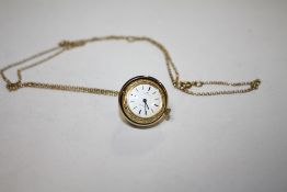 A JAQUET-DROZ INCABLOC YELLOW METAL SWIVEL PENDANT WATCH ON CHAIN STAMPED 9K