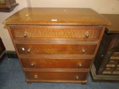 A VINTAGE OAK FOUR DRAWER CHEST H-86 W-81 CM