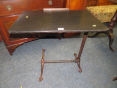 A VINTAGE CAST BED TABLE