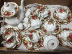 A TRAY OF ROYAL ALBERT OLD COUNTRY ROSES, TO INCLUDE TEA POT, TRIOS, PEPPERETTES ETC.