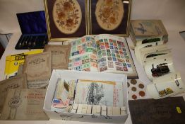 A QUANTITY OF CIGARETTE CARDS BOTH LOOSE AND IN ALBUMS TOGETHER WITH A WORLD STAMP ALBUM,