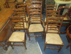 A SET OF EIGHT OAK WICKERSEAT LADDERBACK CHAIRS ( 6+2 )