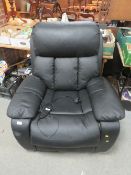 A MODERN BLACK LEATHER STYLE ELECTRIC RISE RECLINER